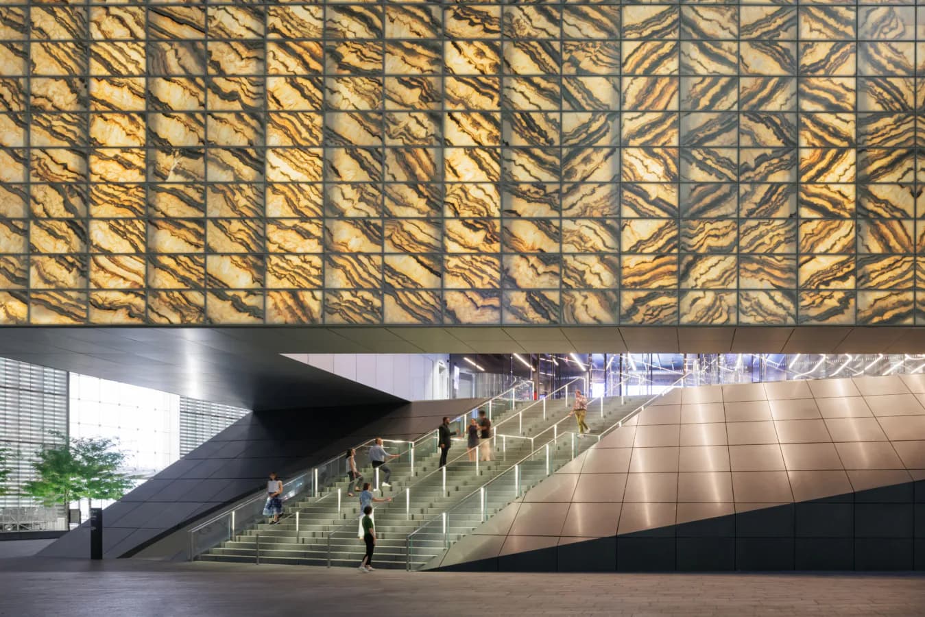Modern interior with dramatic angular overhead lattice screening casting geometric shadows across a spacious floor, monumental staircase, and minimal figures, designed by REX.